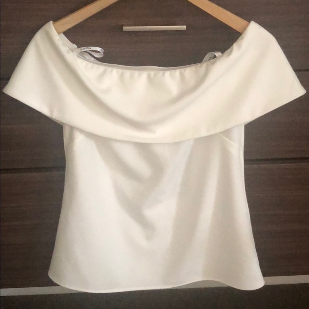 Joseph Ribkoff off shoulder crepe top.